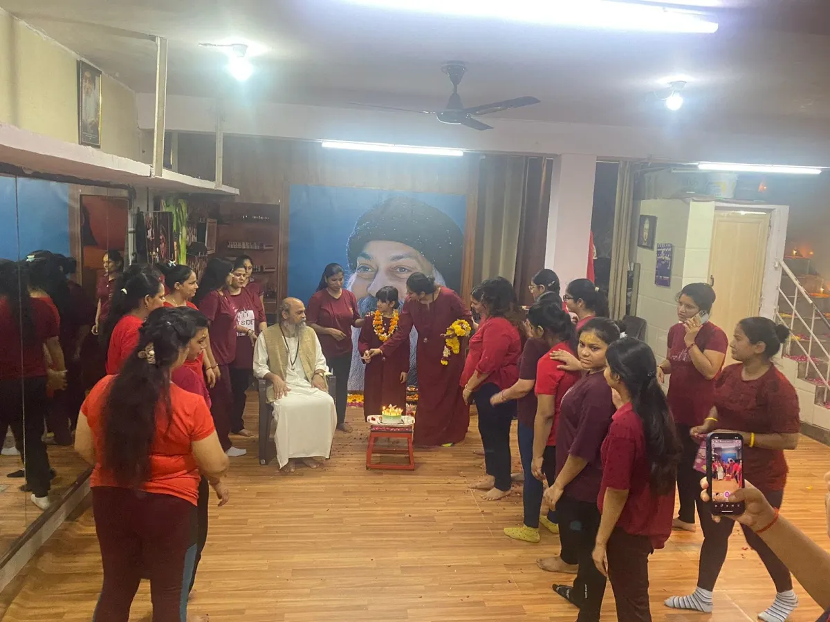 A workshop in an Indian institution, participants standing in a circle